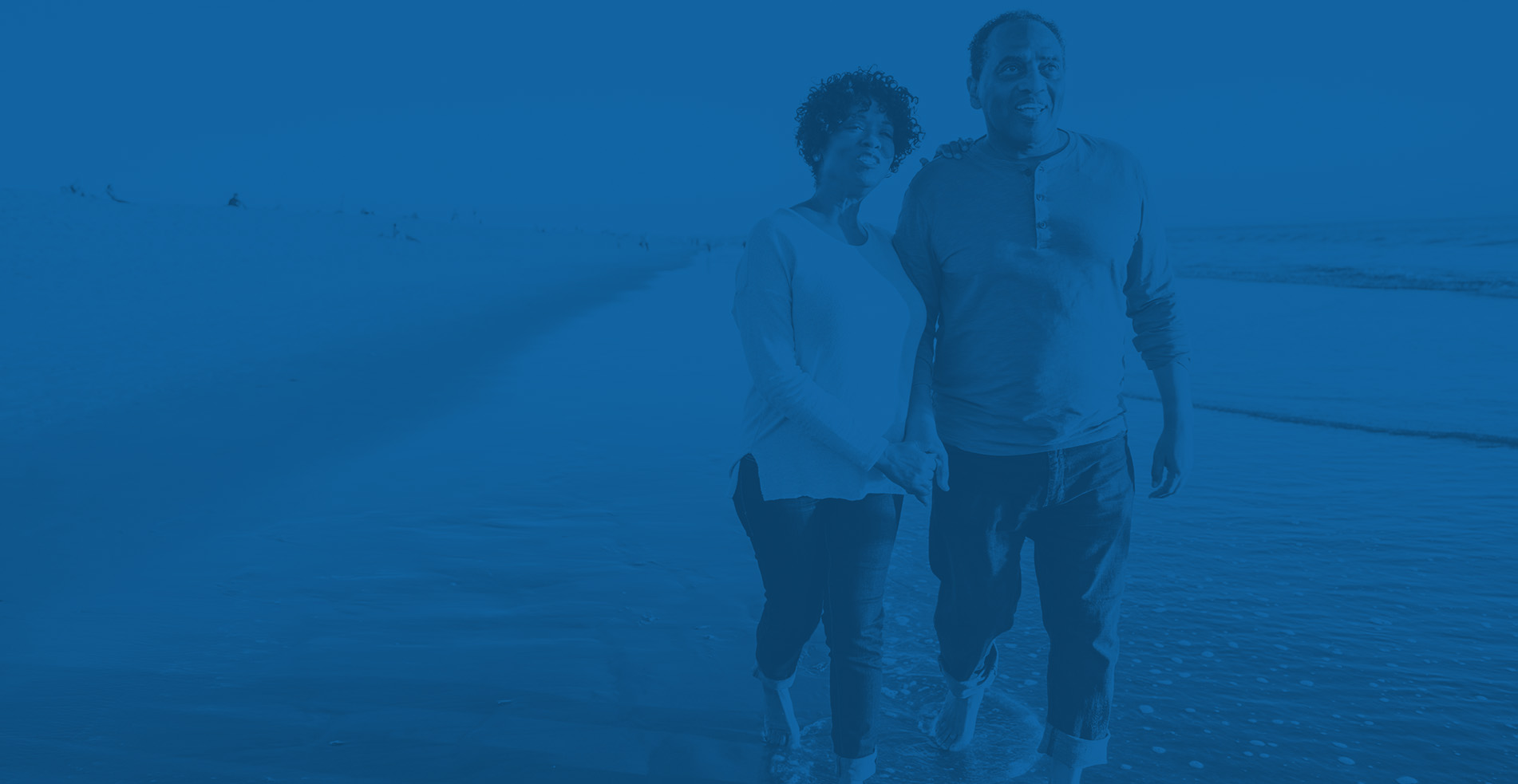 Couple walking on the beach