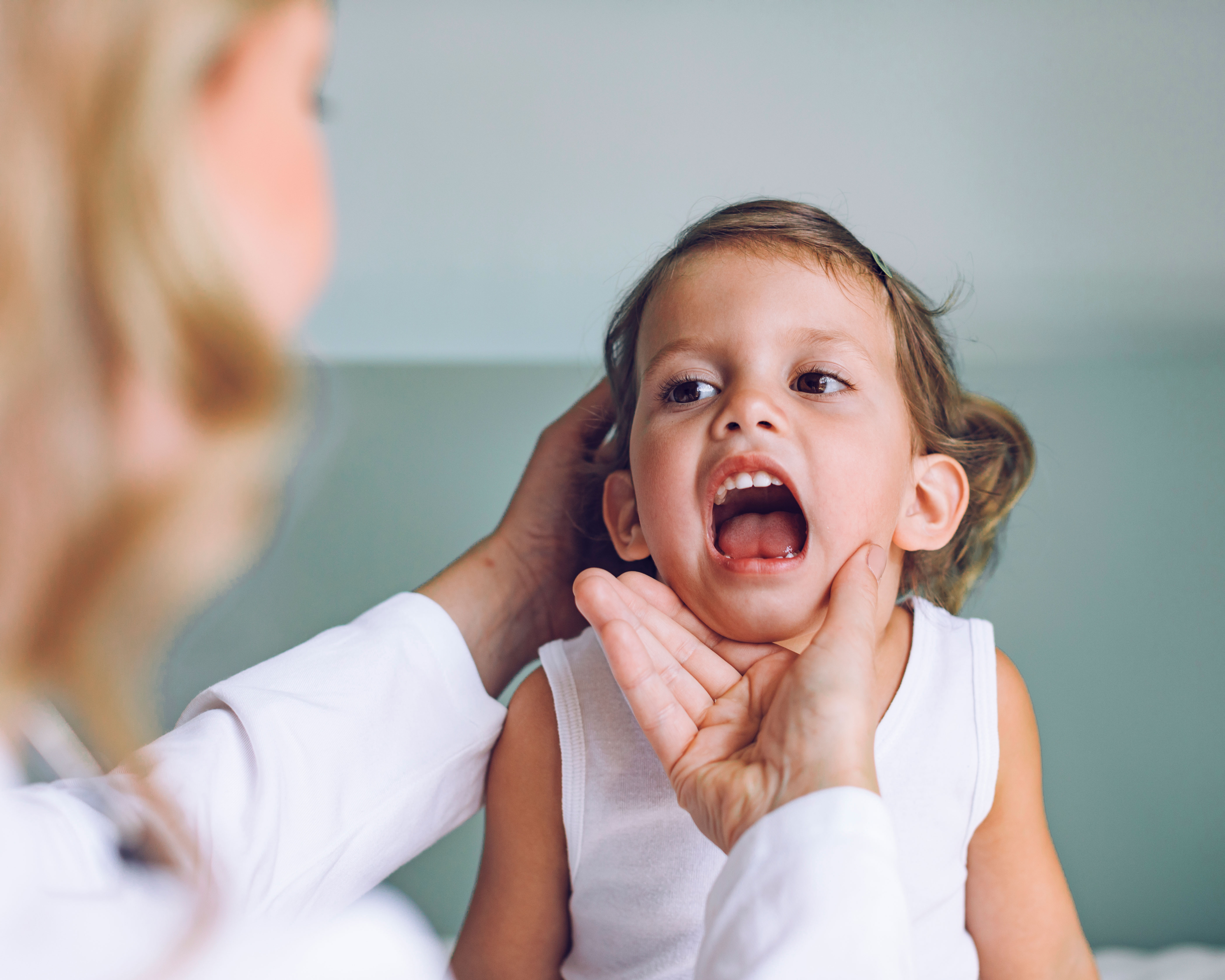 Checking kid's throat