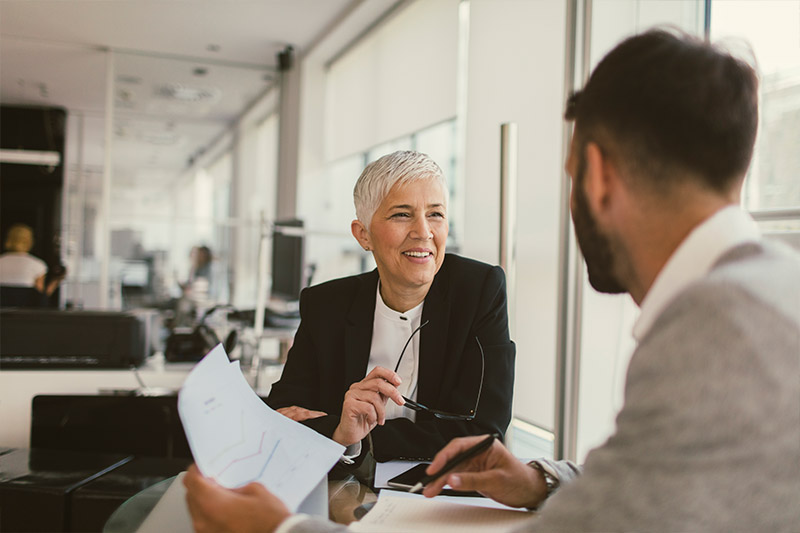 banner-business.jpg Two people meeting