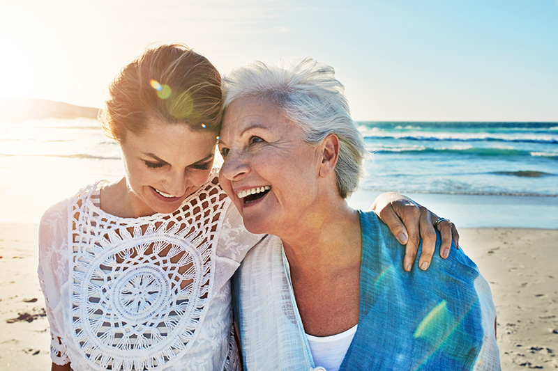 Mom and daughter on the beach