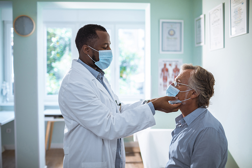 Physician treating a patient