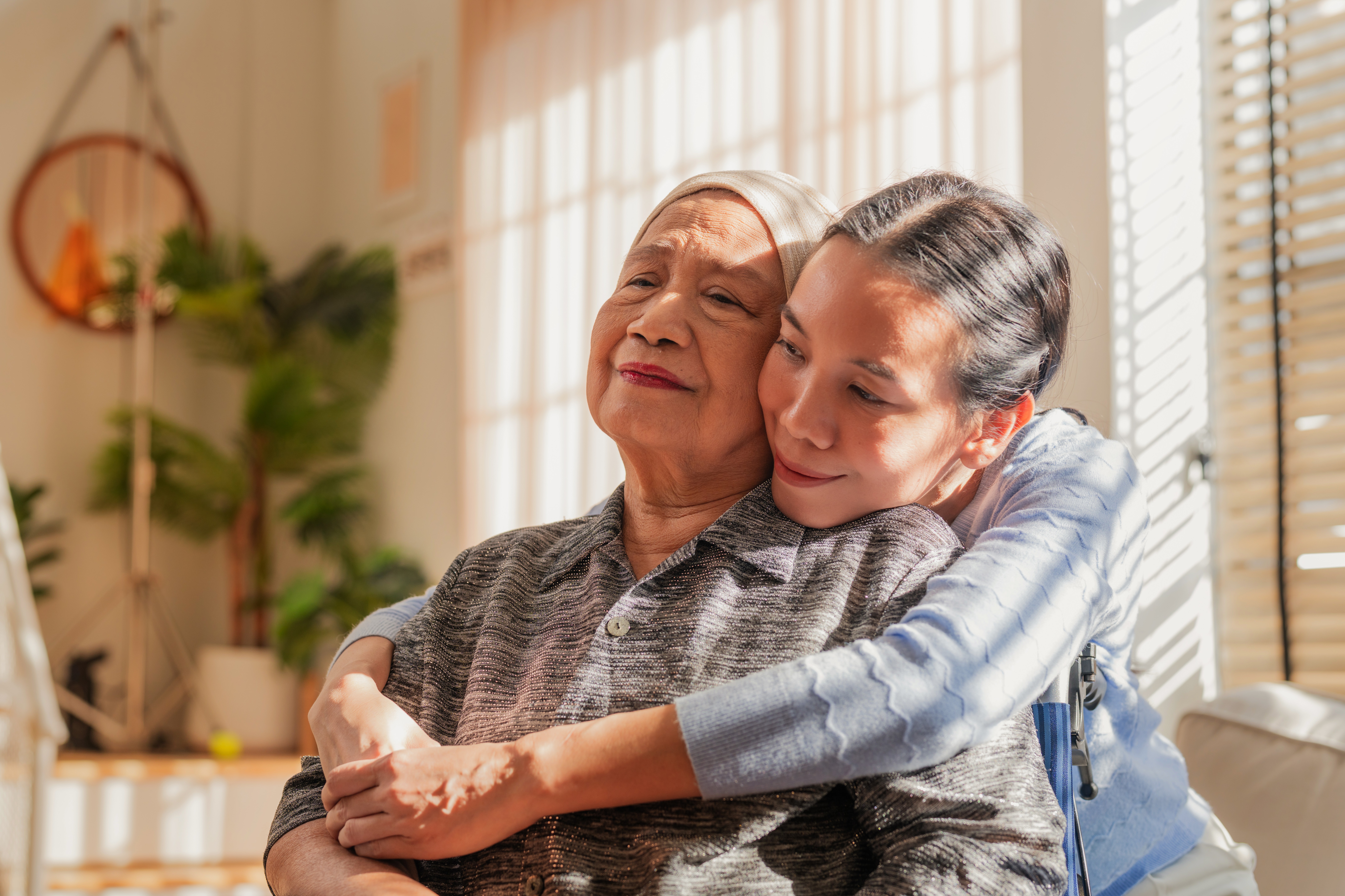 woman hugging cancer patient