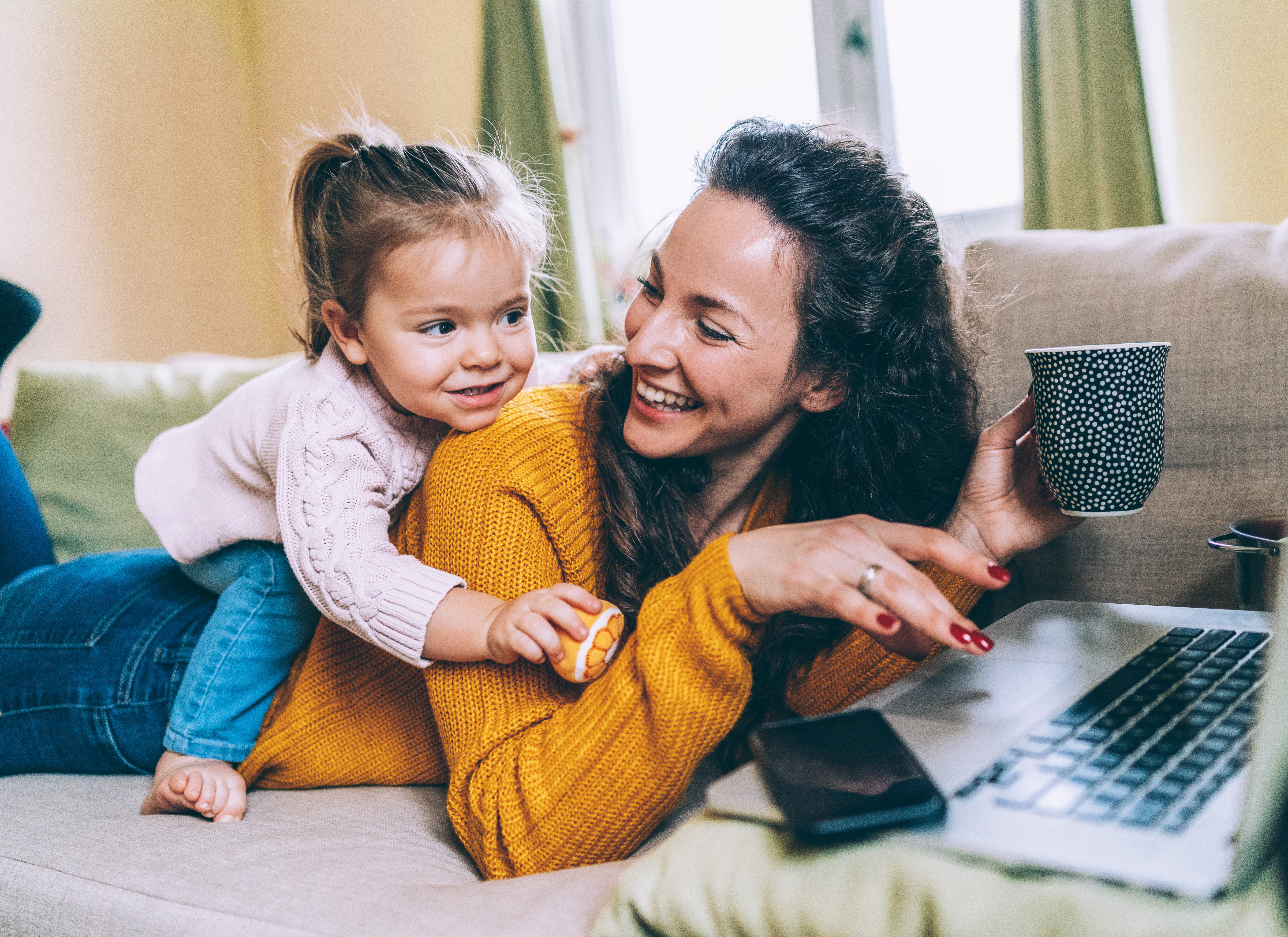 mother and her child on sofa