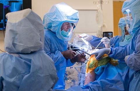 Surgeons using VELYS™ Robotic-Assisted Solution perform a knee replacement with the use of data tailored to patient’s anatomy