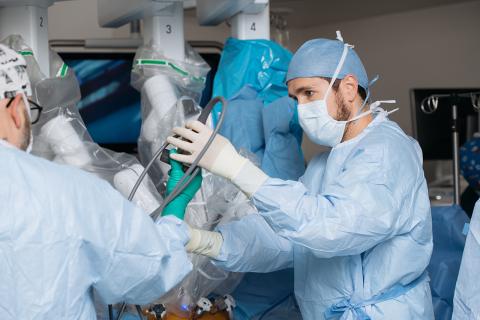 Dr. Jarrod Buzalewski performing robotic surgery