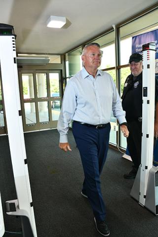 Scott Phillips, VP of Supply Chain and Support Services, passes through metal detection on his way into TidalHealth’s Emergency/Trauma Center in Salisbury.
