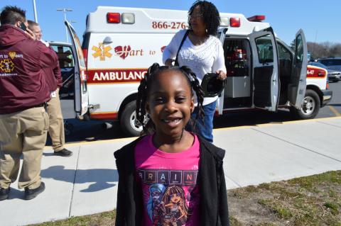 child at healthfest ambulance