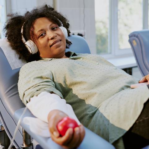 Woman in chair donating blood