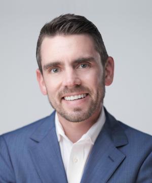 Travis Peck, MD