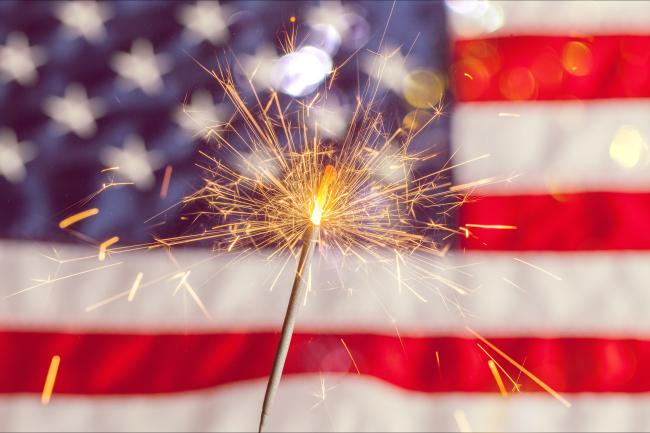 Sparkler in front of American flag