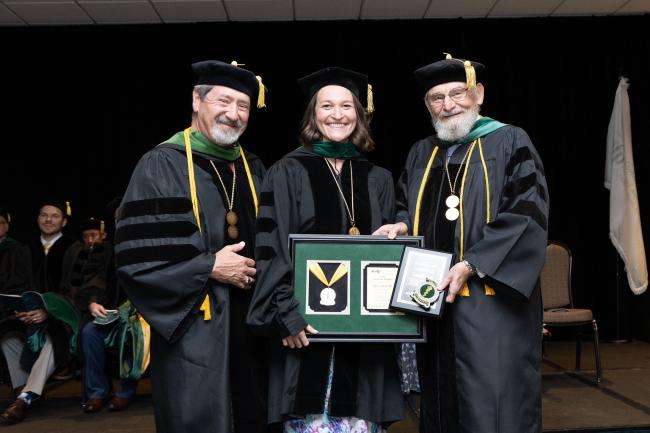 Dr. Hilary Haack being presented her ACOFP Fellow Award