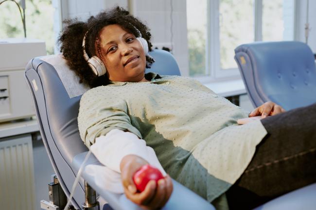 Woman in chair donating blood