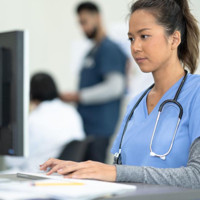 Nurse on computer