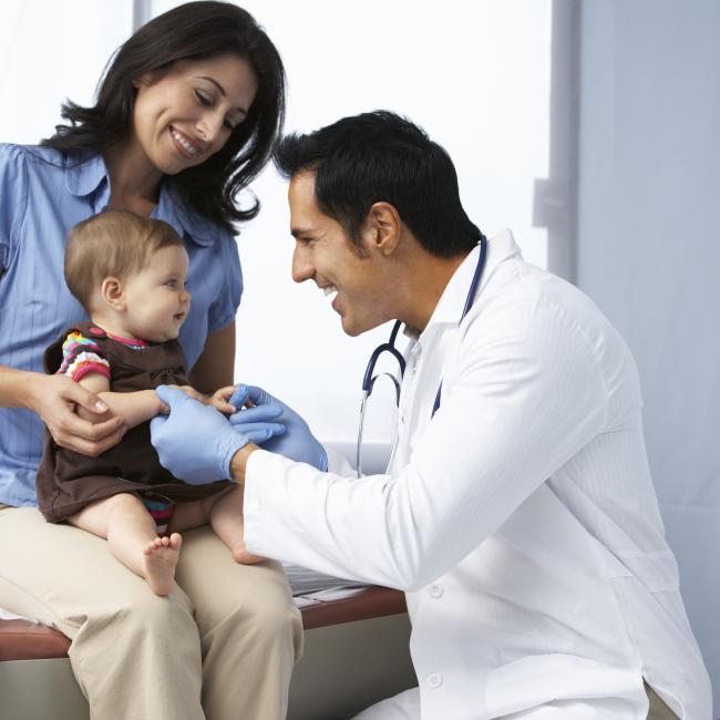 Mother and baby at a doctor's appointment with a doctor