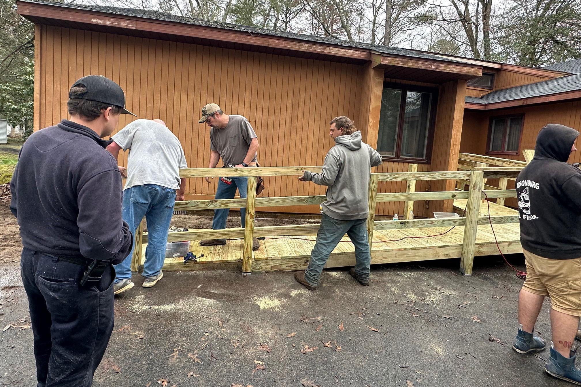 SWIFT team building a wheelchair ramp