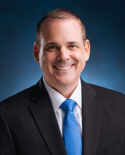 Dr. Charles Dolan