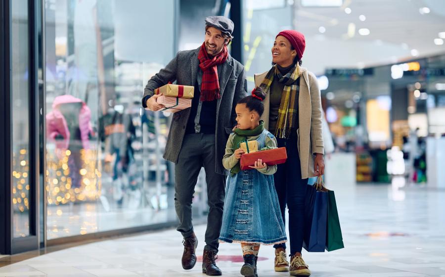 multi-racial family holiday shopping