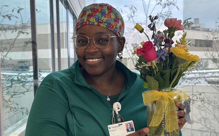 a woman holding flowers in celebration