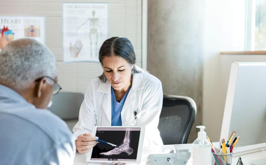 foot xray review with patient and doctor