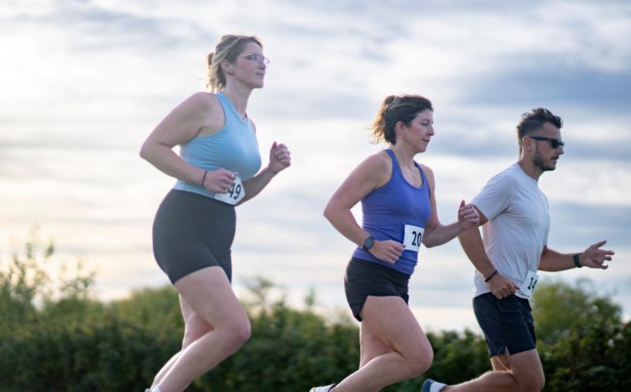 Runners at dusk