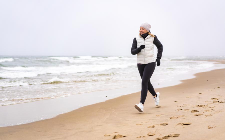 woman running on beach
