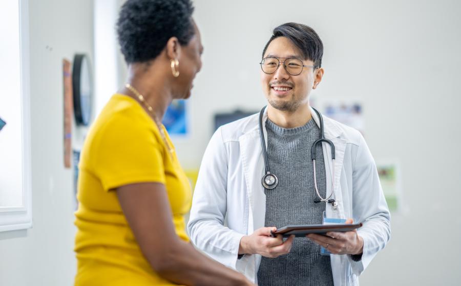 Doctor speaking with patient