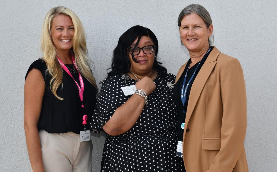 Photo of Kita Douglas (center), Jessica Hales (left) and Kathryn Fiddler (right).